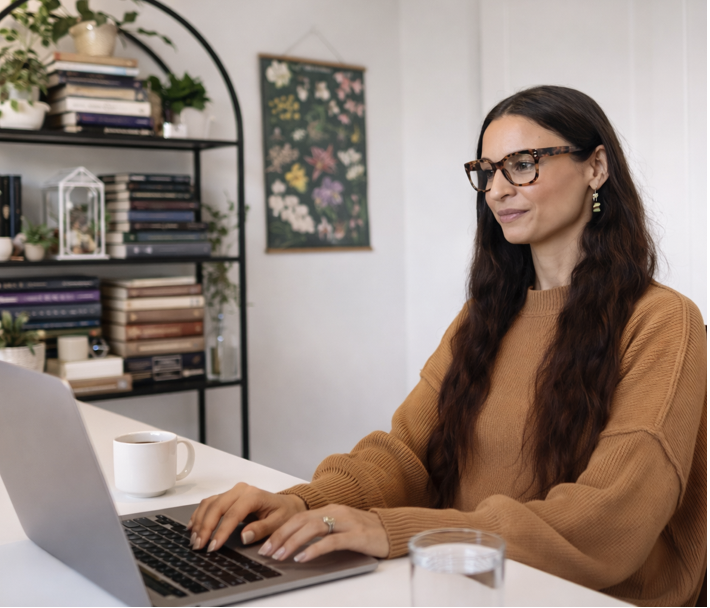 Dr. Bailey Bryant at her desktop